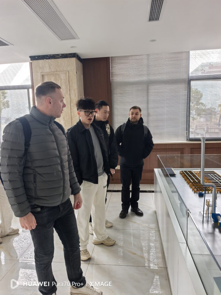 Customers viewing the production line model