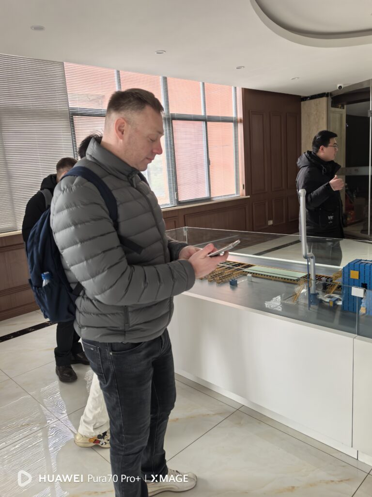 Customer reviewing the production line model