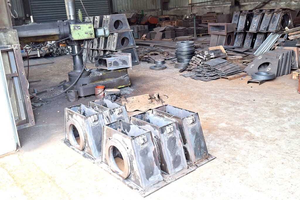 CNC machining center producing precision parts for shot blasting machines